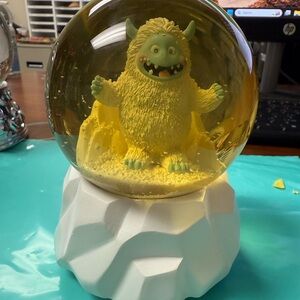 Yellow Monster Christmas holiday musical Snow Globe